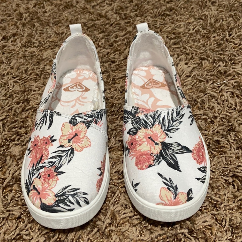 Size 13 slip on girls flower shoes.    Never worn outside.   Basically new.